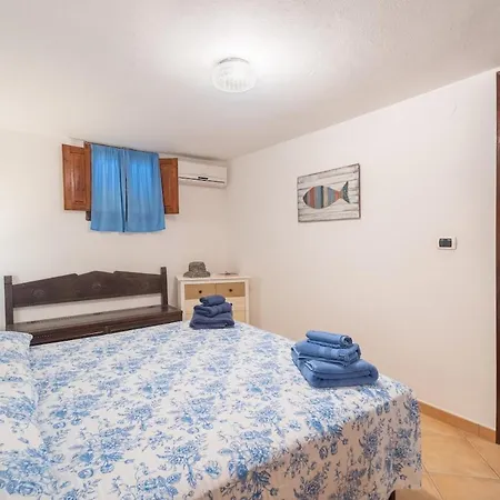 Vakantiehuis Degli Angeli - Portopinetto Porto Pino