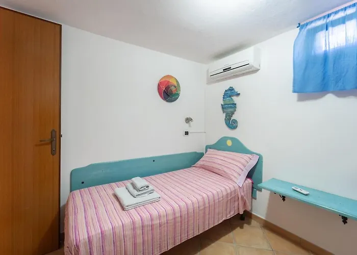Degli Angeli - Portopinetto Hébergement de vacances Porto Pino